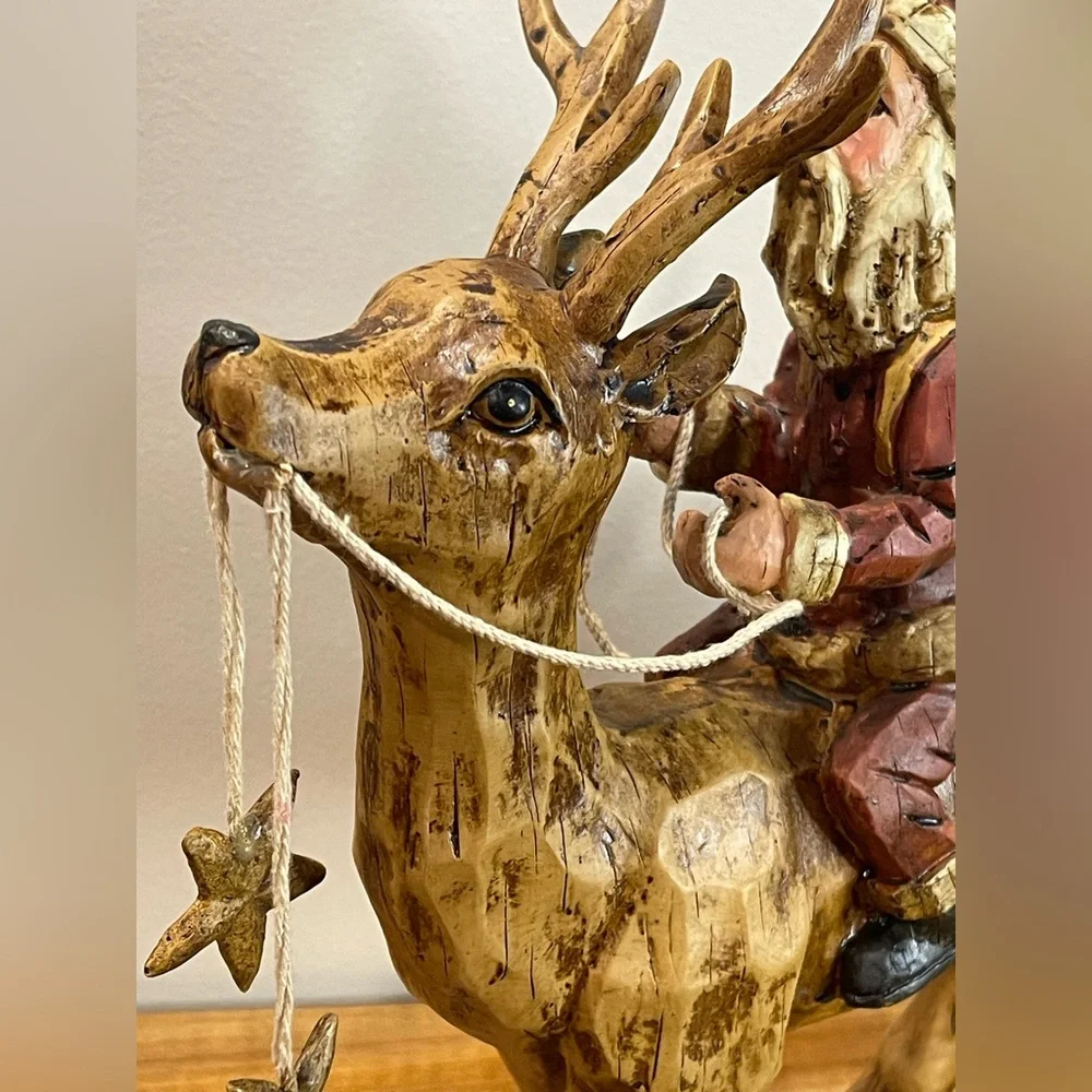 Primitive Folk Art Santa riding Reindeer 12”‎ tall chiseled resin faux wood